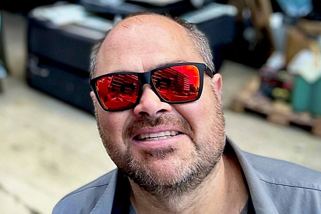 James Kidd, Wellways Volunteer wearing red reflective sunglasses