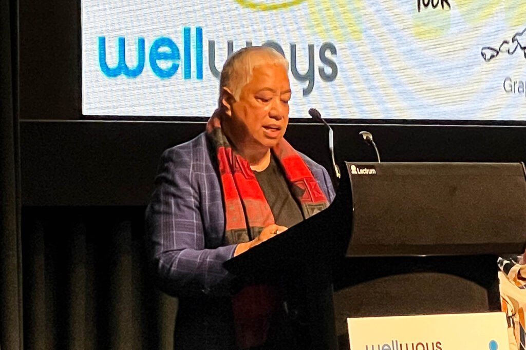 Maggie Toko speaking at the Woodcock Lecture 2024