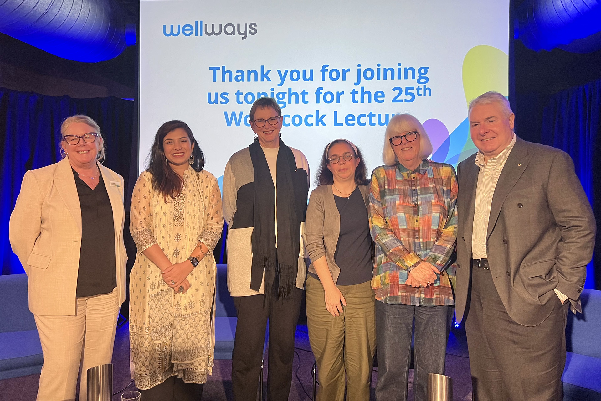 The panel of speakers at the woodcock lecture posing for a photo