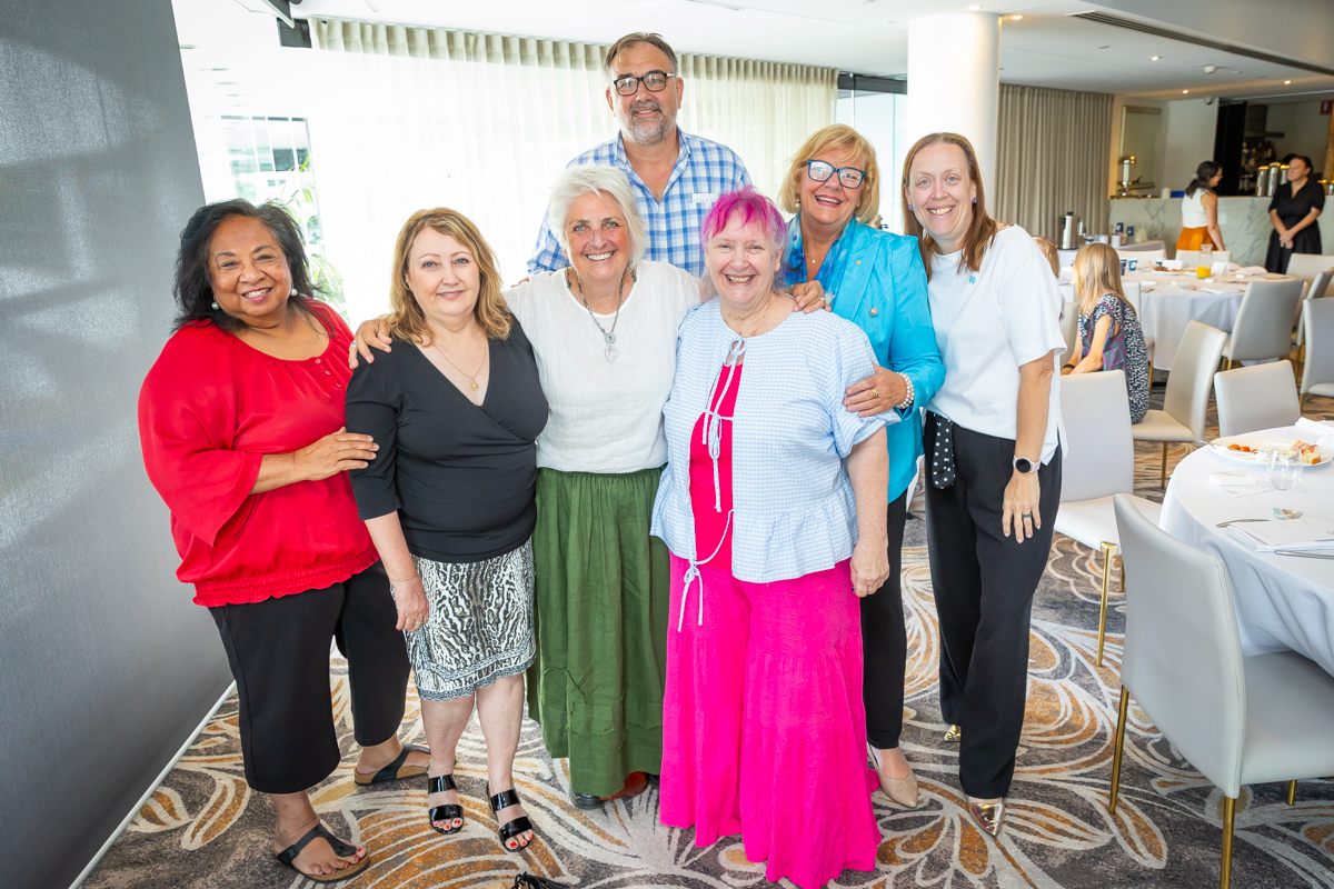 A group of people posing for a photo