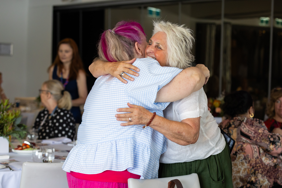 Two poeple embracing